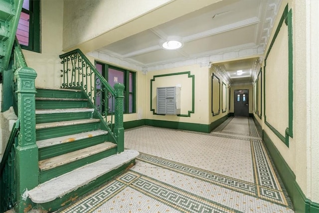 hallway featuring ornamental molding