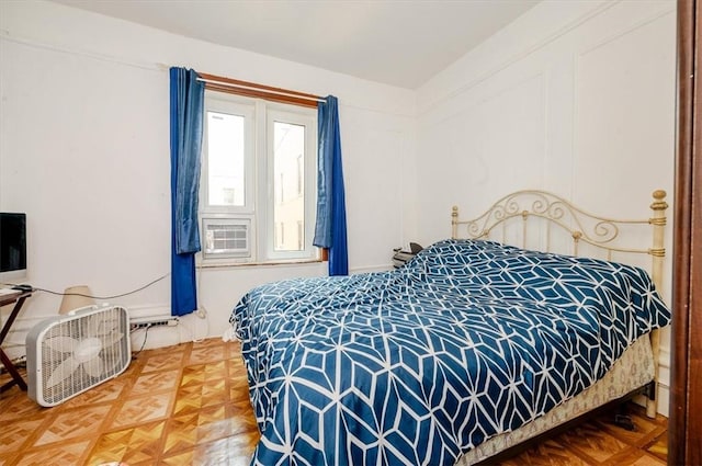 bedroom with parquet flooring