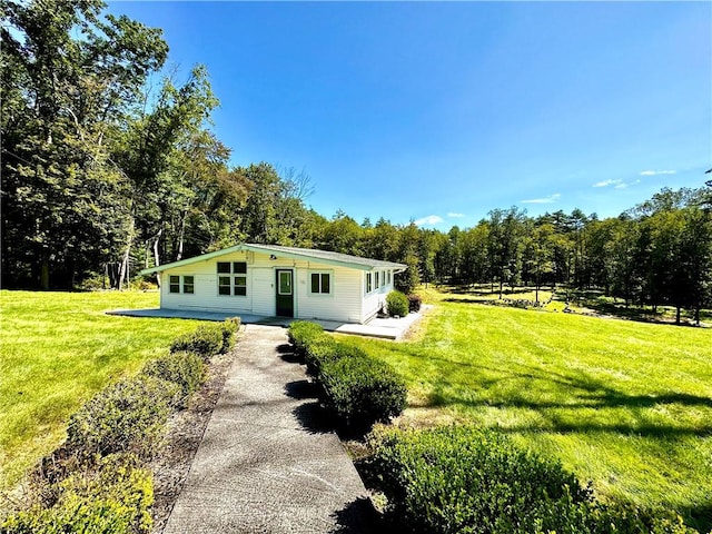 exterior space with a front lawn