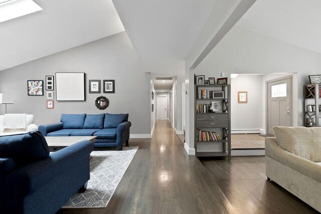 living room with high vaulted ceiling, baseboard heating, and dark wood-type flooring