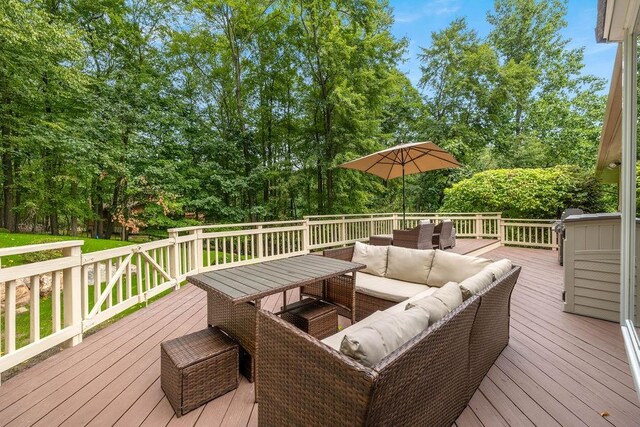 wooden deck featuring outdoor lounge area