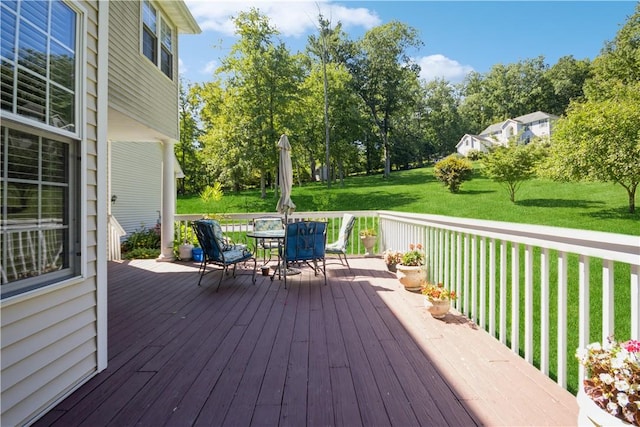 wooden deck with a yard