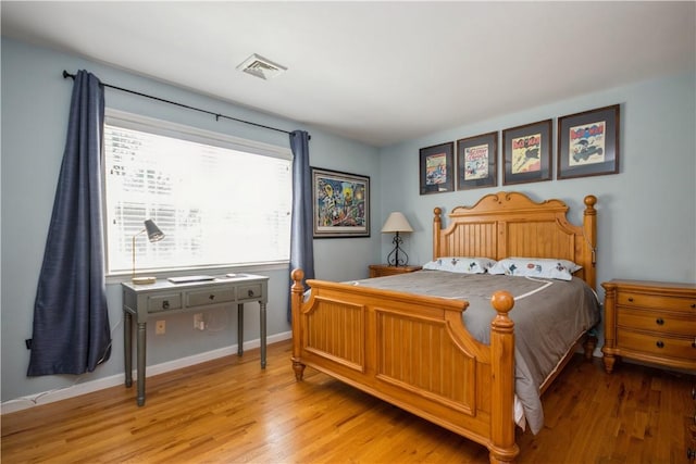 bedroom featuring light hardwood / wood-style flooring