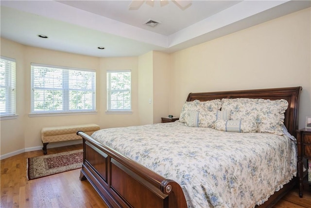 bedroom featuring ceiling fan and hardwood / wood-style flooring