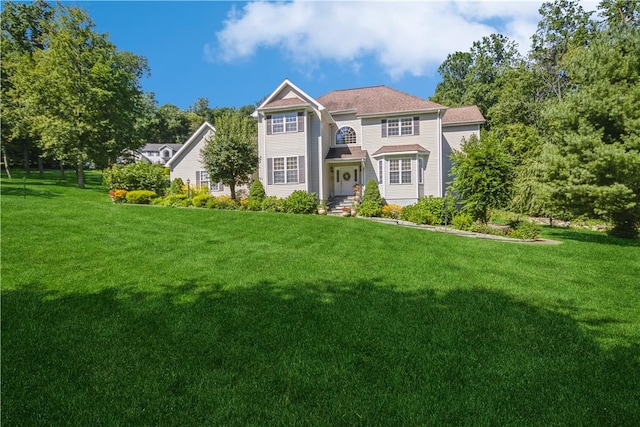 view of front facade with a front lawn