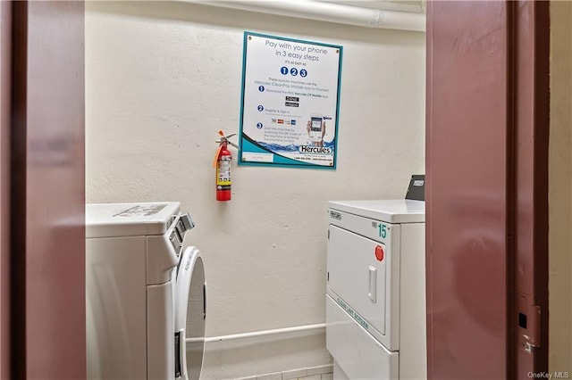 laundry area featuring independent washer and dryer