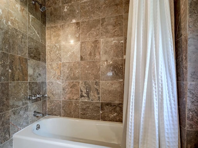 bathroom with shower / bath combo