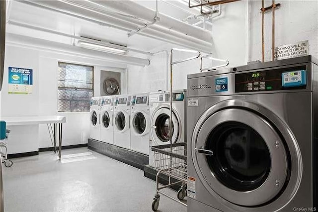 clothes washing area with independent washer and dryer