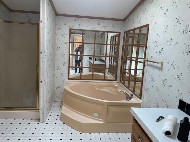 bathroom featuring vanity, crown molding, and plus walk in shower