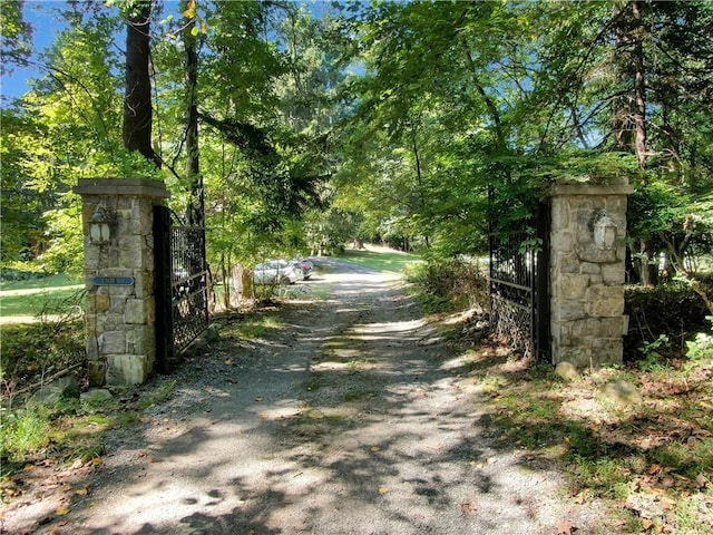 4 Deer Run, Sparkill, NY 10976 - view of road with a gate, a gated entry, and a view of trees
