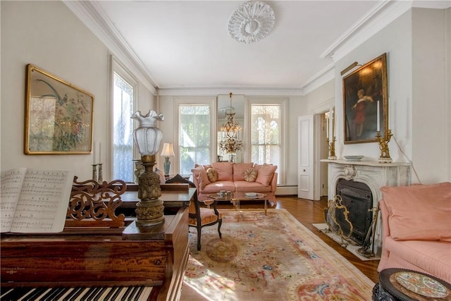 interior space featuring hardwood / wood-style floors, crown molding, and a baseboard radiator