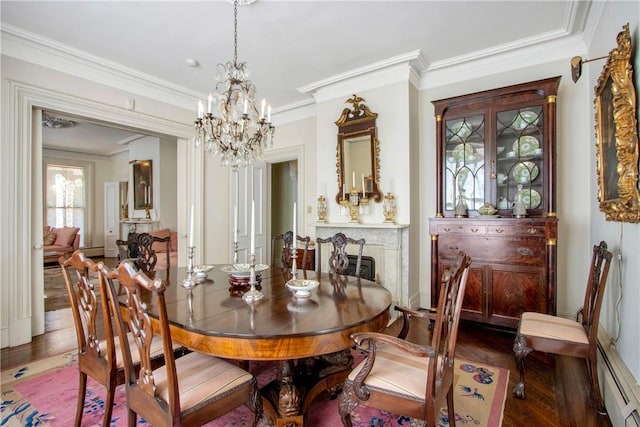 4 Deer Run, Sparkill, NY 10976 - dining space featuring a chandelier, a baseboard radiator, wood finished floors, and crown molding