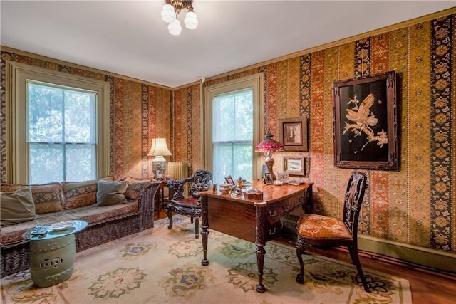 office area featuring an inviting chandelier