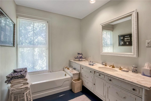4 Deer Run, Sparkill, NY 10976 - bathroom featuring healthy amount of natural light, a bath, and vanity