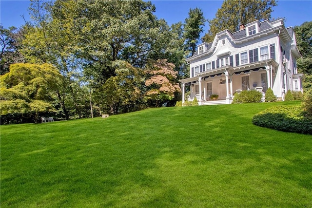 view of yard featuring ceiling fan