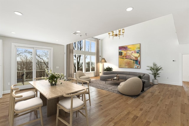 201 Tweed Blvd, Piermont, NY 10960 - dining room featuring a chandelier, wood finished floors, and recessed lighting