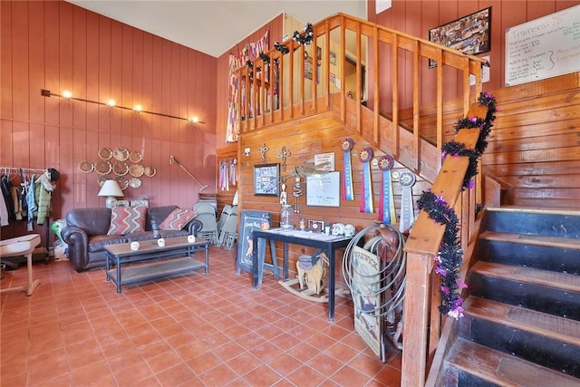 living room with wooden walls