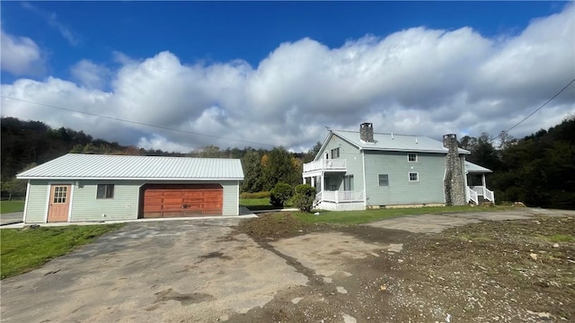 view of property exterior featuring a garage