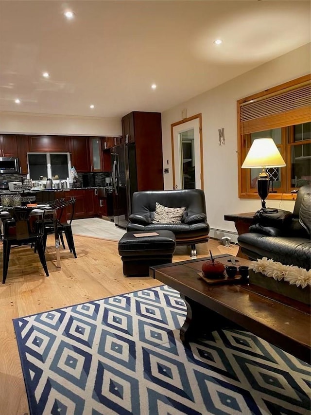 living room with light hardwood / wood-style floors