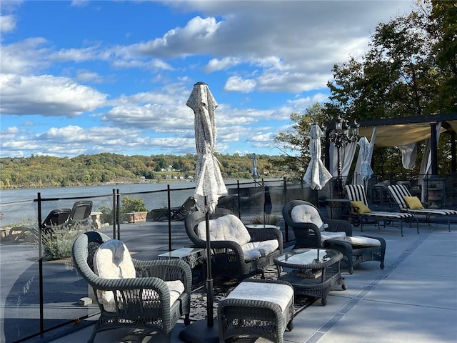 view of patio / terrace with a water view