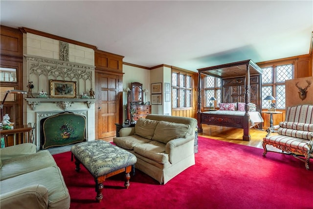 living room featuring crown molding and hardwood / wood-style flooring