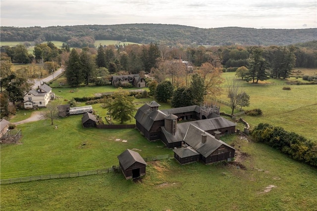 drone / aerial view featuring a mountain view and a rural view