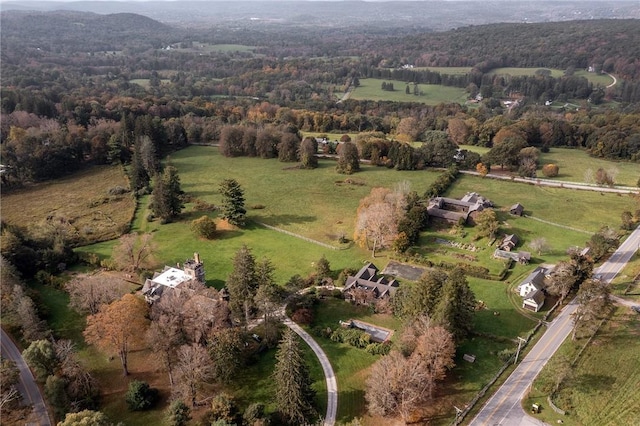 birds eye view of property with a rural view