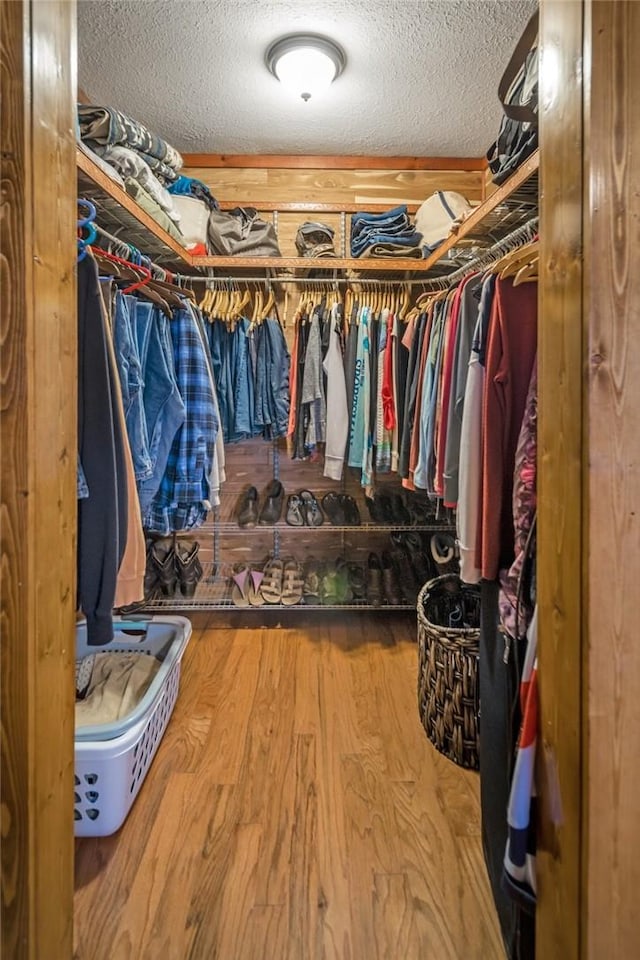 spacious closet with wood-type flooring