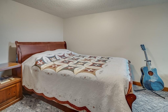 bedroom featuring a textured ceiling