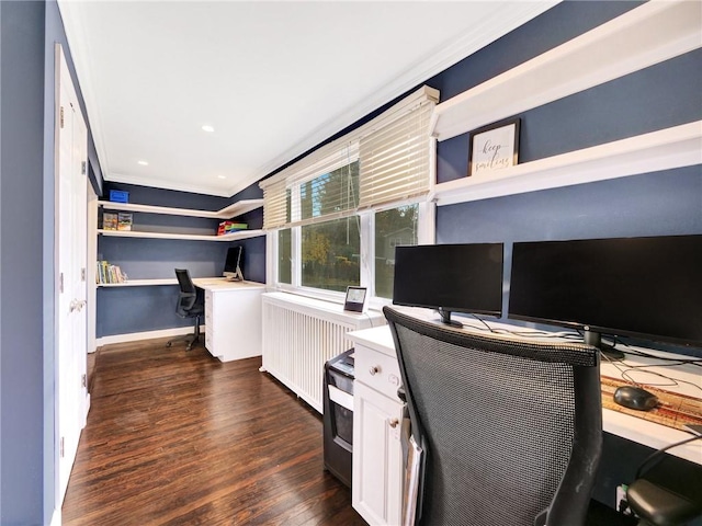 office featuring dark hardwood / wood-style floors, built in desk, ornamental molding, and radiator heating unit