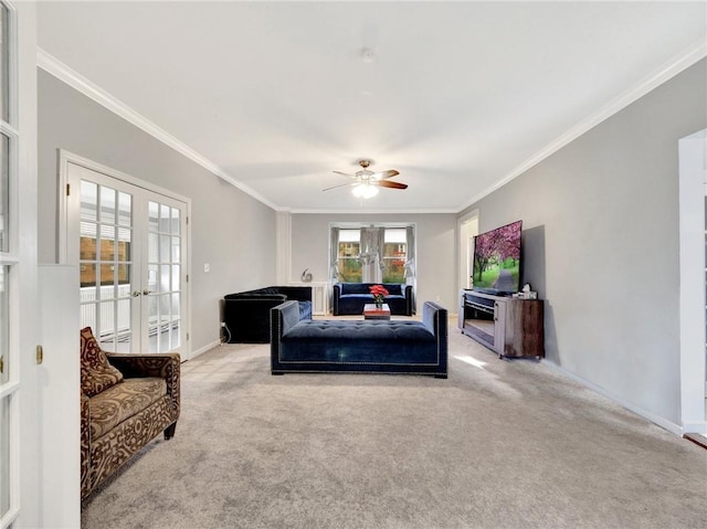 carpeted bedroom featuring ceiling fan, french doors, and ornamental molding