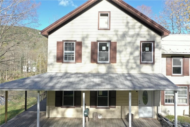 country-style home with a deck