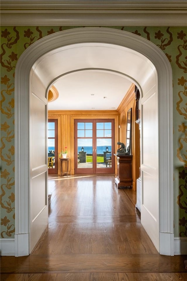 12 Island Dr, Rye, NY 10580 - hall featuring hardwood / wood-style floors, french doors, and ornamental molding