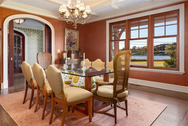 12 Island Dr, Rye, NY 10580 - dining space with hardwood / wood-style floors, coffered ceiling, an inviting chandelier, a water view, and ornamental molding