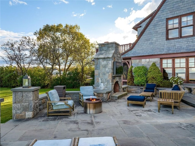 12 Island Dr, Rye, NY 10580 - view of patio / terrace with an outdoor living space with a fireplace