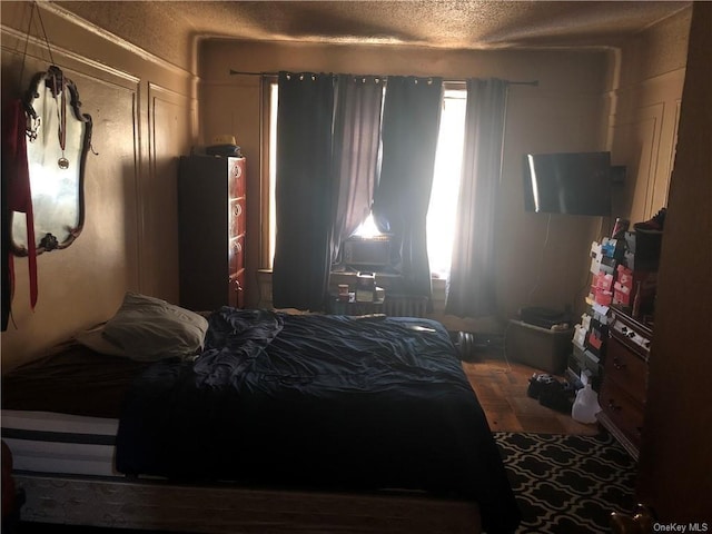 bedroom featuring hardwood / wood-style flooring