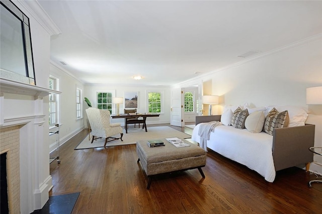 living room featuring a fireplace, ornamental molding, and dark wood-type flooring