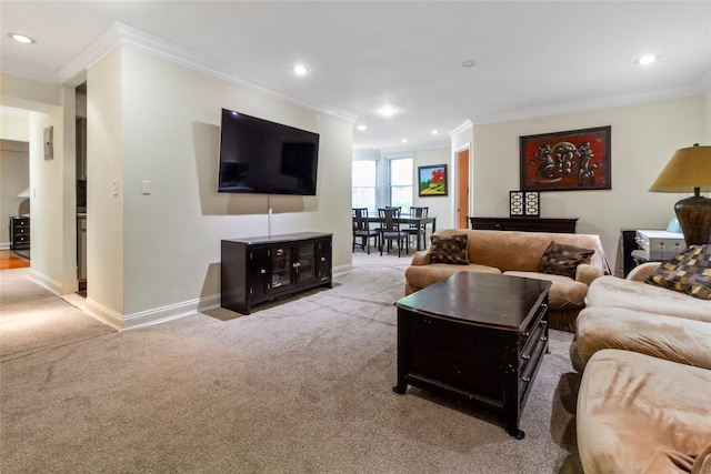 living area featuring ornamental molding, carpet, baseboards, and recessed lighting