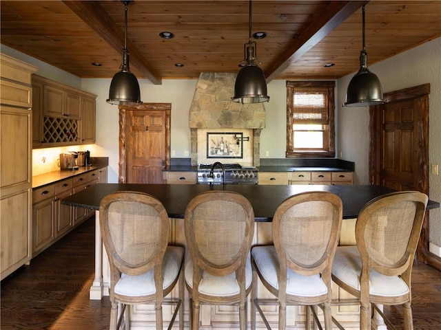 kitchen with dark wood-type flooring, wood ceiling, and decorative light fixtures