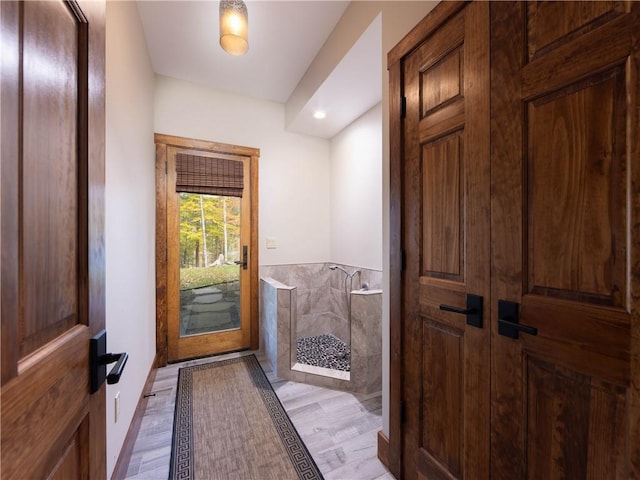 entryway with light hardwood / wood-style floors