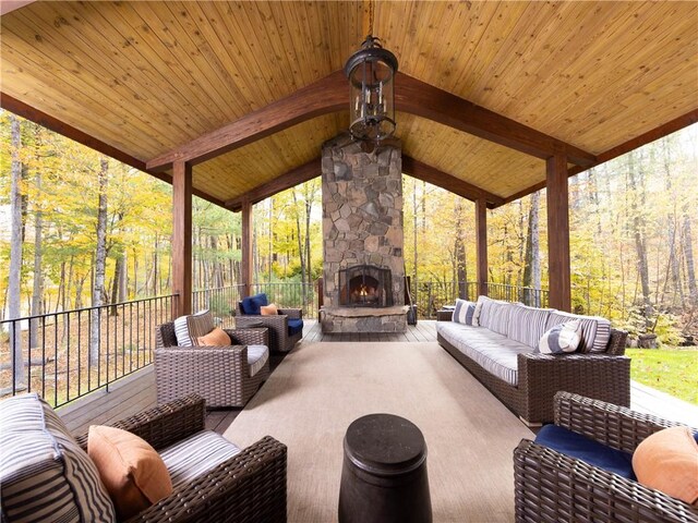 view of patio / terrace featuring an outdoor living space with a fireplace