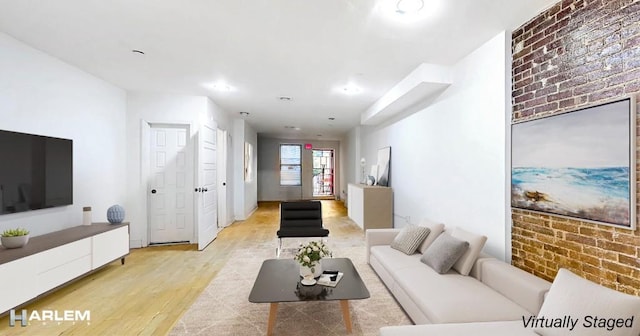 living room with light hardwood / wood-style floors