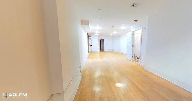 corridor featuring light wood-type flooring