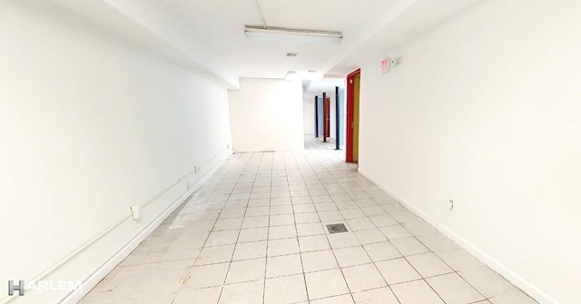 hallway featuring light tile patterned floors