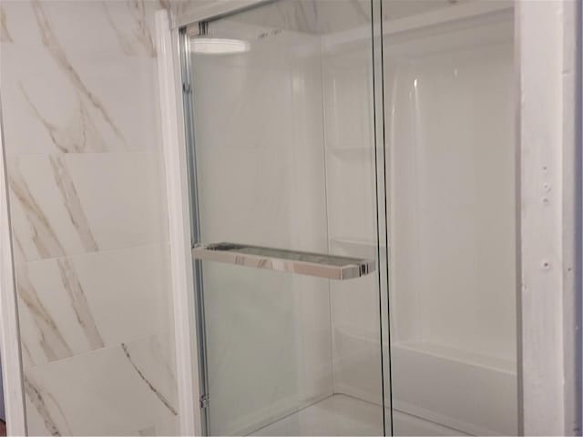 bathroom with a stall shower