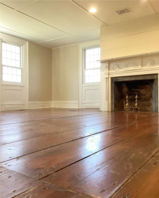 interior space with a wealth of natural light and wood-type flooring