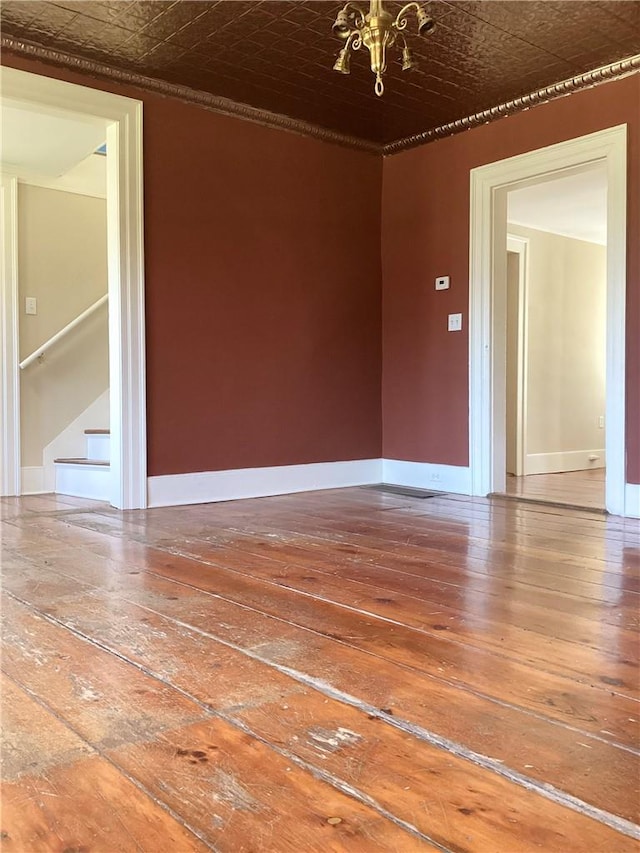 unfurnished room featuring hardwood / wood-style floors