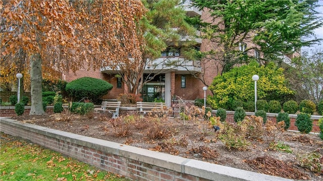 view of property hidden behind natural elements