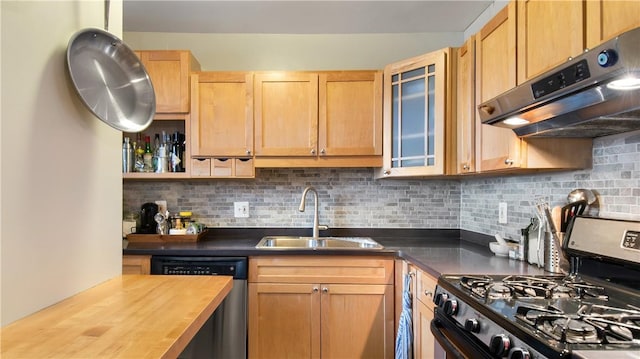 kitchen with black gas range, dishwasher, sink, tasteful backsplash, and wooden counters