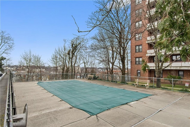 view of pool featuring a patio area